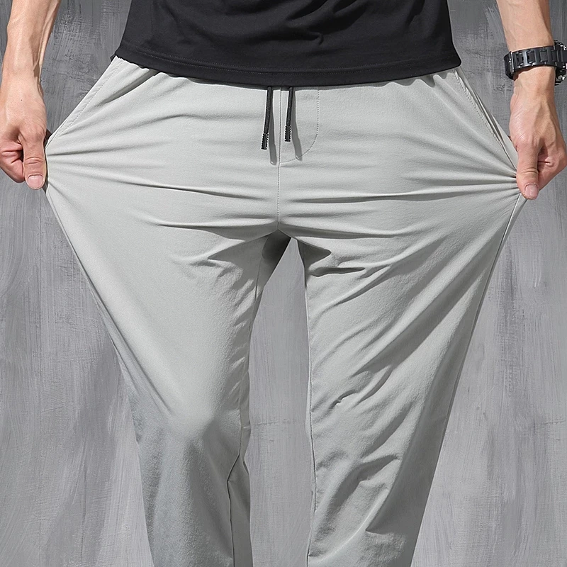 

New Nine Leggings Men 's Trend Fat Loose Summer Thin Sports Leisure Versatile Haren Elastic Pants