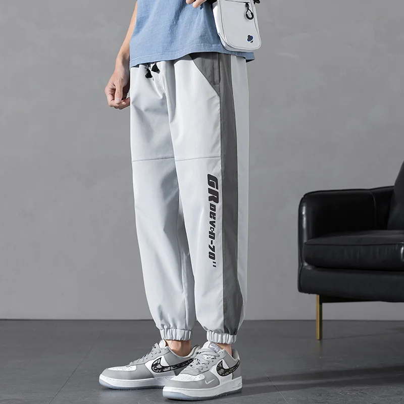 

New Men Joggers Breathable Male Printting Trousers Casual Pants Man Fashion Patchwork Sweatpants Elastic Waist Streetwear 2021