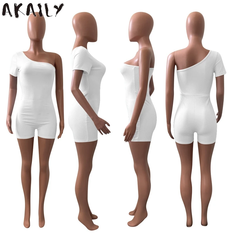 

Akaily 2021 Streetwear Black Slim Rompers Solid Womens Jumpsuit Summer Outfit White One Shoulder Bodycon Backless Romper Female