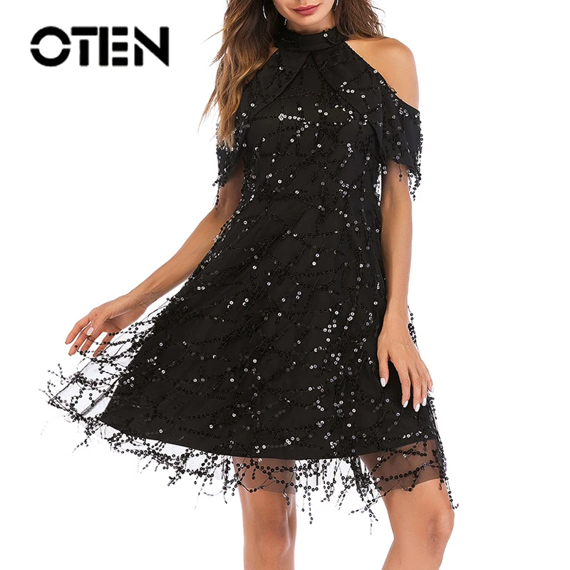 OTEN 2019 Summer Sexy Party Dresses Women Black Sequin Halter Dew Shoulder Elegant A-Line Tassel Short Sleeves Female Clothing