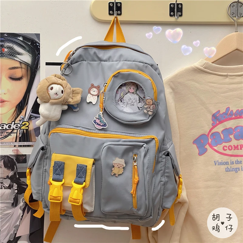 

YJ1099 2021 new Contrasting color backpack female Japanese cute girl heart backpack