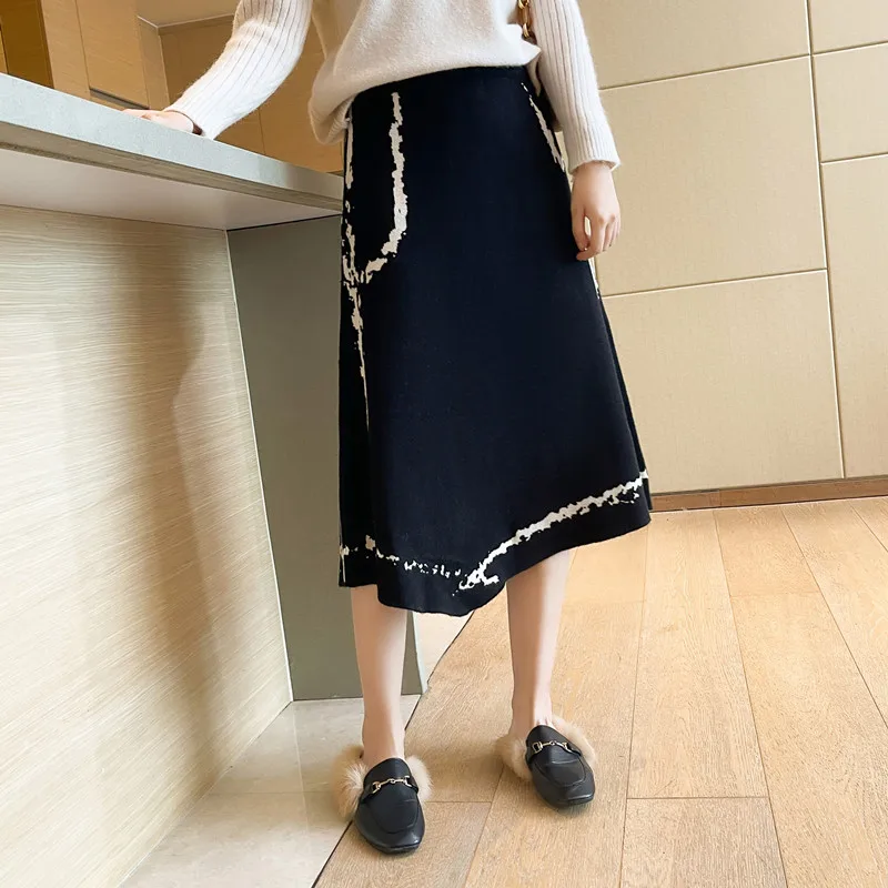 

Knitted skirt women's autumn and winter skirt 2021 medium length new black irregular hem A-line wool long skirt