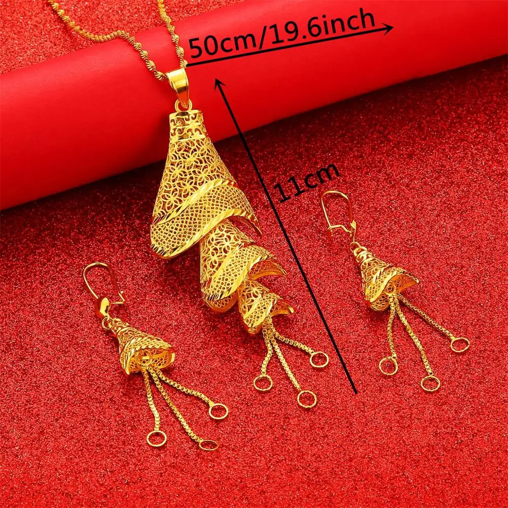 Комплект ювелирных изделий из ожерелья и сережек с большим африканским кулоном