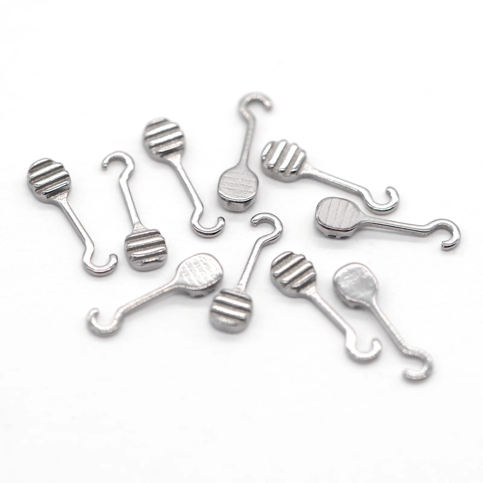

Dentstb10pcs/bag Dental Ortodontic Bondable Sliding Crimpable hook left ight on archwire Bracket Brace orthodontic wires