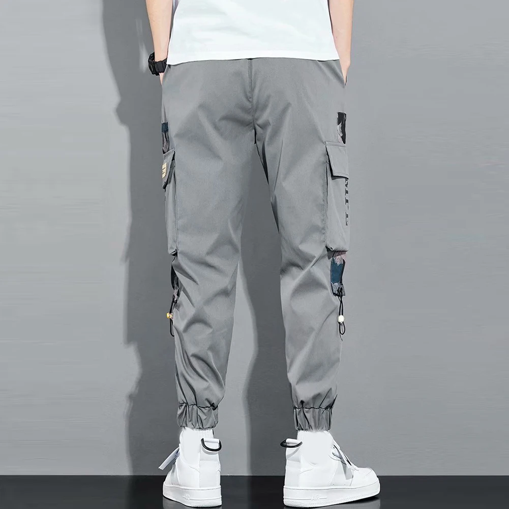 

2021 Streetwear Joggers Men Spring Autumn Fashion Men Pocket Pants Cotton Sports Pants Elastic Waist Trousers with Drawstring
