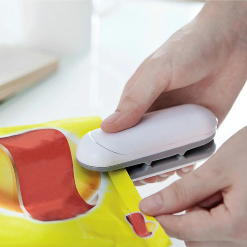 

Portable Mini Plastic Sealing Machine Snack Sealing Machine Heat Package Machines Kitchen Gadgets Bag Heat Sealer
