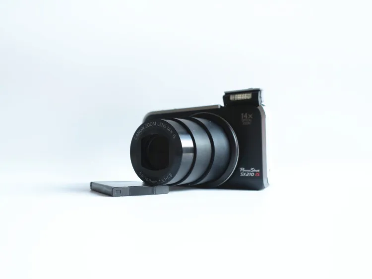 

USED Canon PowerShot SX210IS 14.1 MP Digital Camera with 14x Wide Angle Optical Image Stabilized Zoom and 3.0-Inch LCD