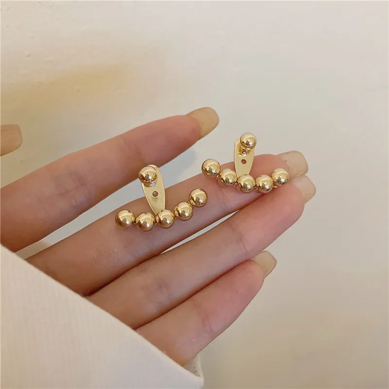 

Cold wind round bead studs earring earrings