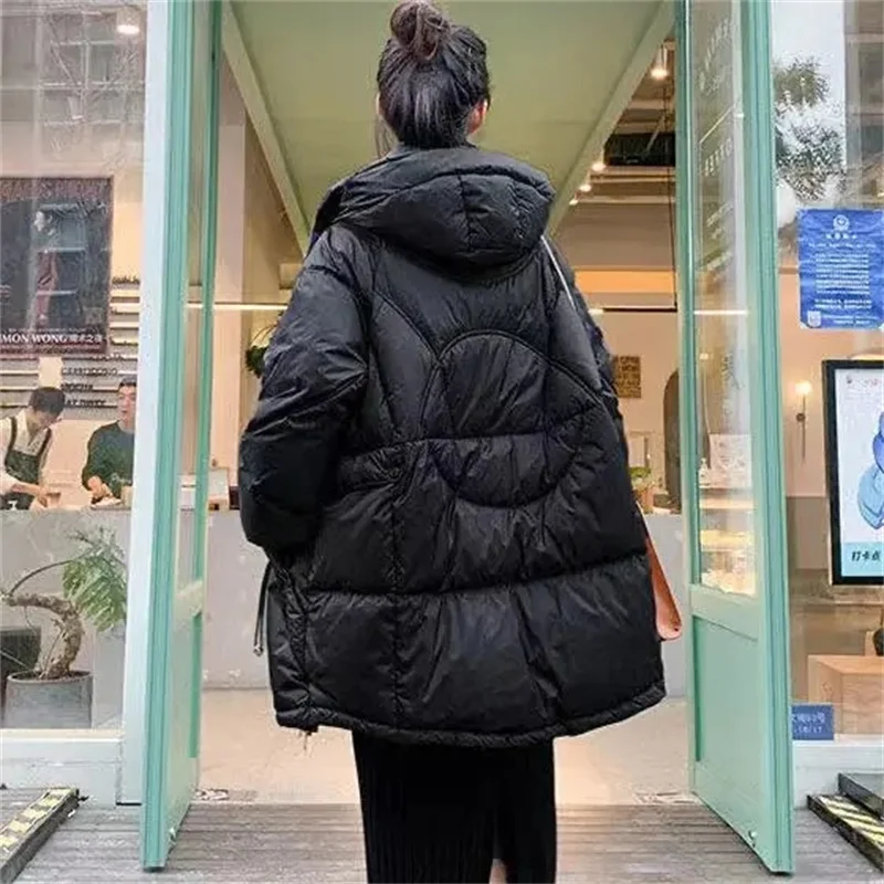 Рисунок 2 - Женский пуховик средней длины