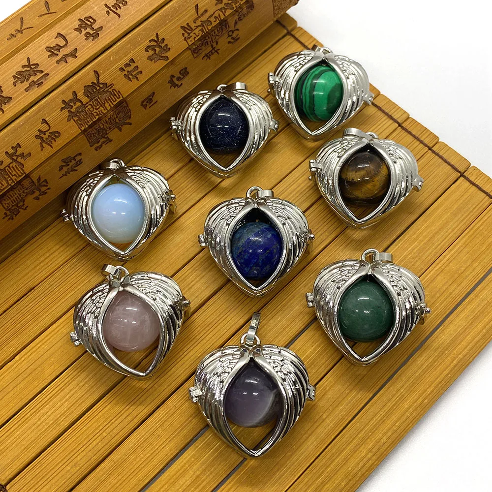 

Natural Stone Crystal Pendant with Heart-shaped Wings Wrapped In Multi-color Suitable for DIY Handmade Fashion Charm Necklace