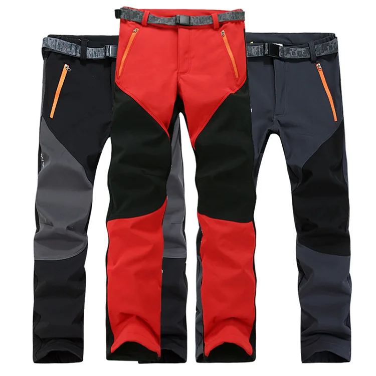 На русском языке это будет: Туристические брюки для мужчин и женщин - теплые, ветрозащитные, из мягкого флиса с эластичностью, для альпинизма и горных лыж.