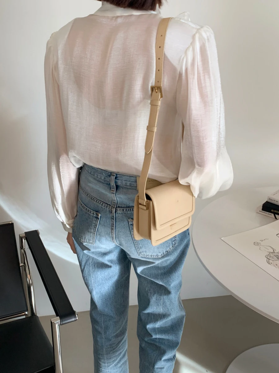 

ZCSMLL Korean summer stand-up collar single-breasted wooden ear stitching luster and slightly puff sleeve shirt women 2021