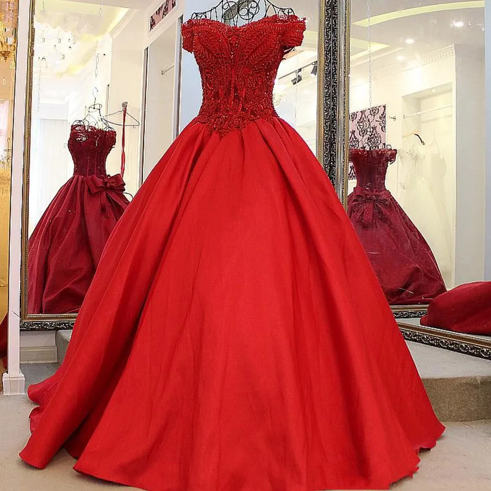 

Red Vintage Puffy Ball Gowns V-neck Beaded Bow Saudi Arabic Prom Dresses Appliques Lace Up Formal Party Dress Robe De Soiree