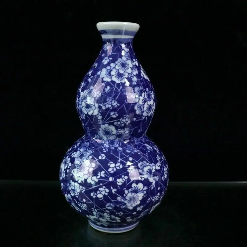 

Китайская старинная фарфоровая сине-белая бутылочная ваза с рисунком ледяной сливы