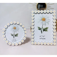 small daisy 4 inch 6 inch 7 inch metal photo frame round rectangle light luxury horizontal and vertical swing frame