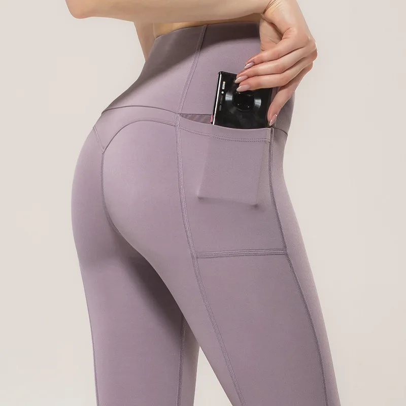 

New stitching nude pocket yoga pants women's running fitness pants high waist high elastic outer wear sports tights nine points