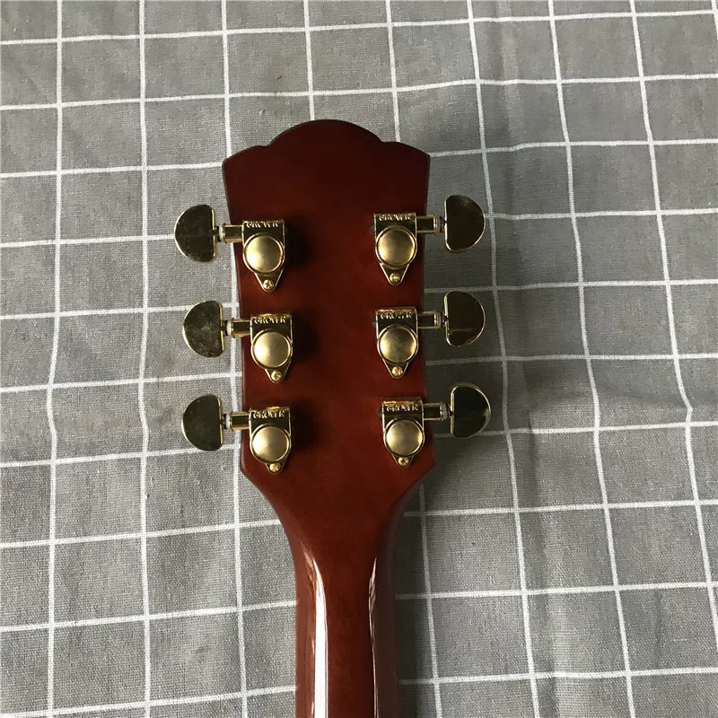 

custom High quality new electric guitar, map maple rotten wood grain veneer, peach blossom core wood. Free delivery