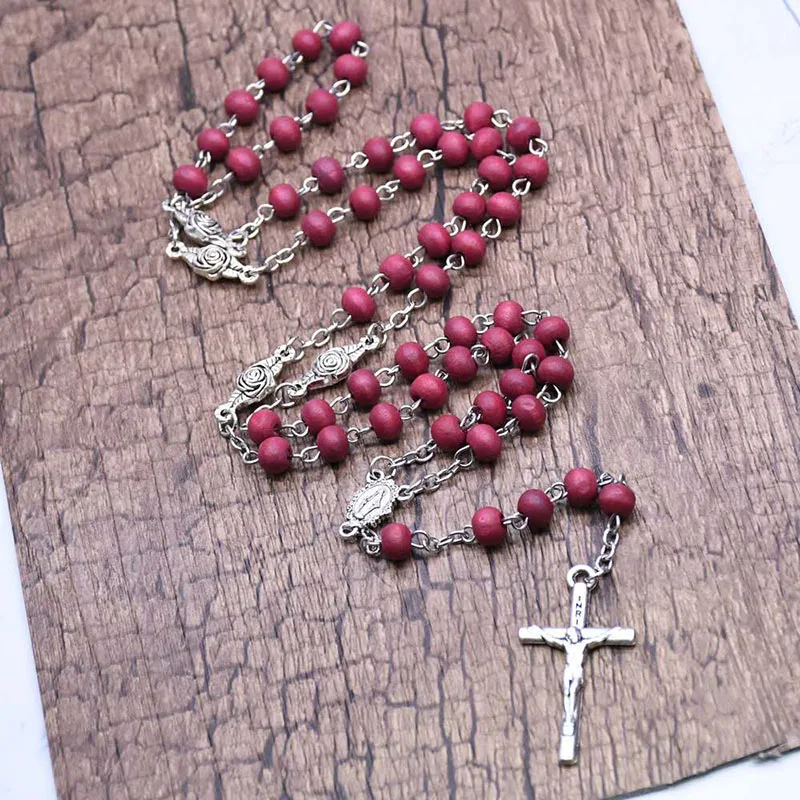 

Religious scented wooden beads red coffee rosesbeads curved needle necklace The Virgin Mary cross given to men and women as gift