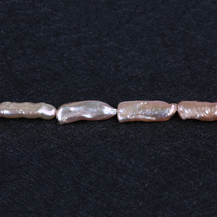 

Wholesale Straight Drilled 6*30mm Purple Biwa Loose Pearls
