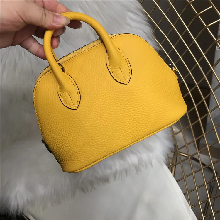 

Classic leather lychee pattern head layer cowhide shell bag one shoulder straddle portable women Mini Bag
