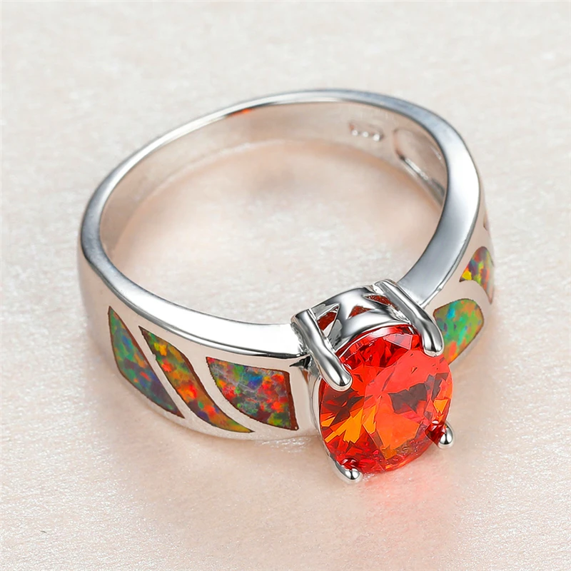 Роскошные женские туфли лодочки красного цвета овальной формы с украшением в