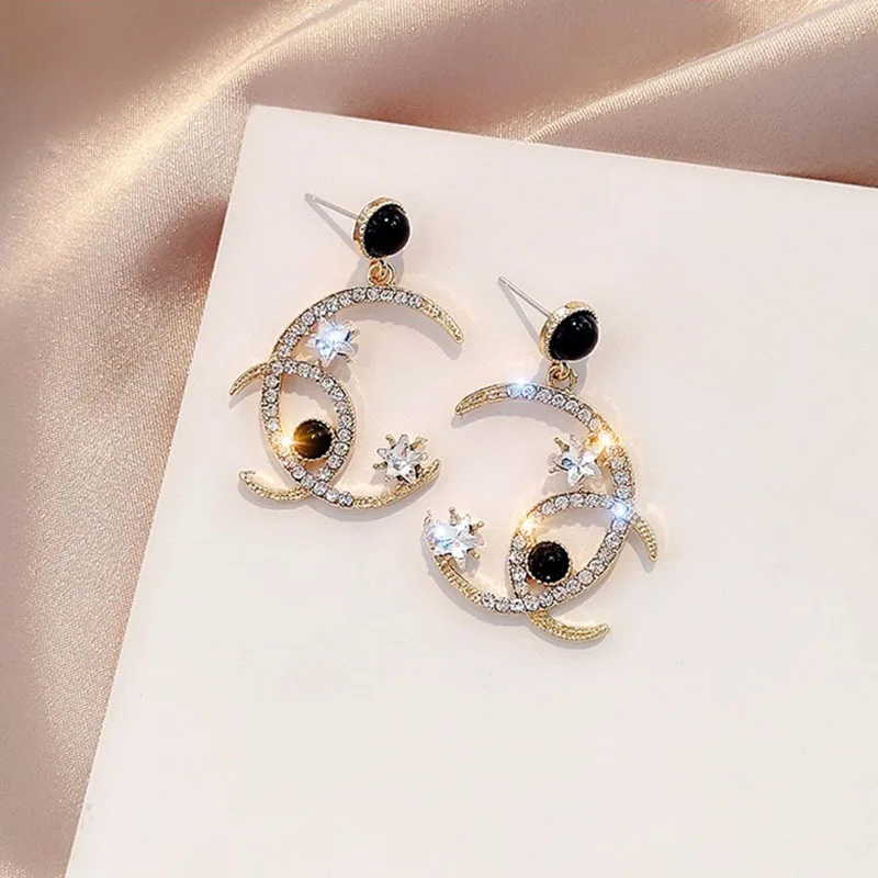 

New diamond-encrusted crystal cross star-moon earrings retro earrings Korean temperament earrings