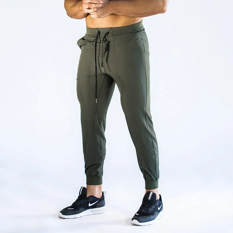 

New Men Pants Fashion leisure Pencil pants Pure color Pants Male Trousers Mens Joggers breathable Tight Pants Mens Sweatpants