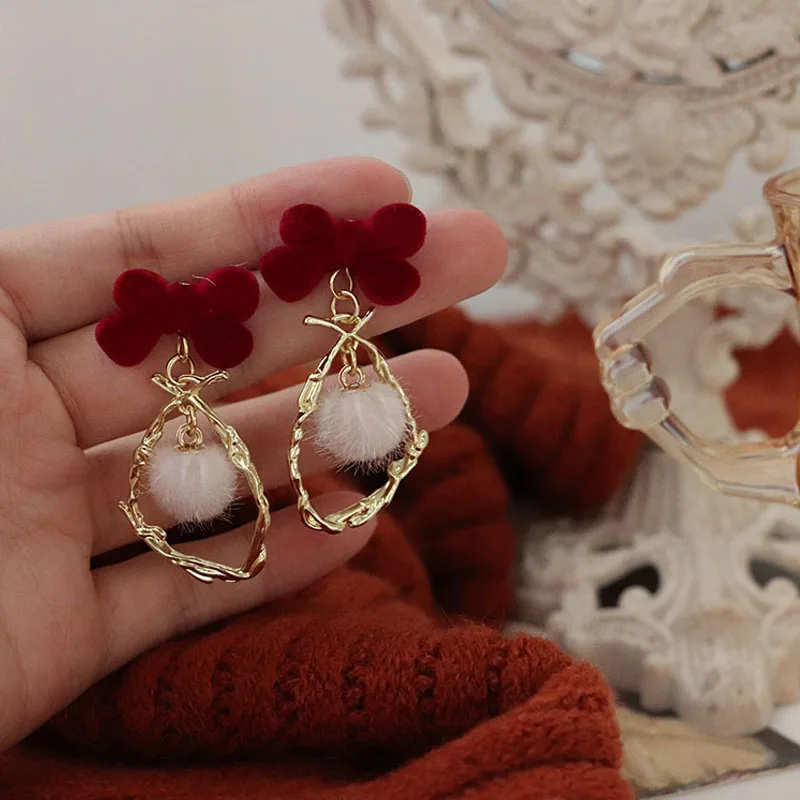 

Korean New Fashion Burgundy Velvet Bow Earrings For Women Elegant Style Cute Girl Pom Pom Ball Stud Earrings Jewelry Wholesale