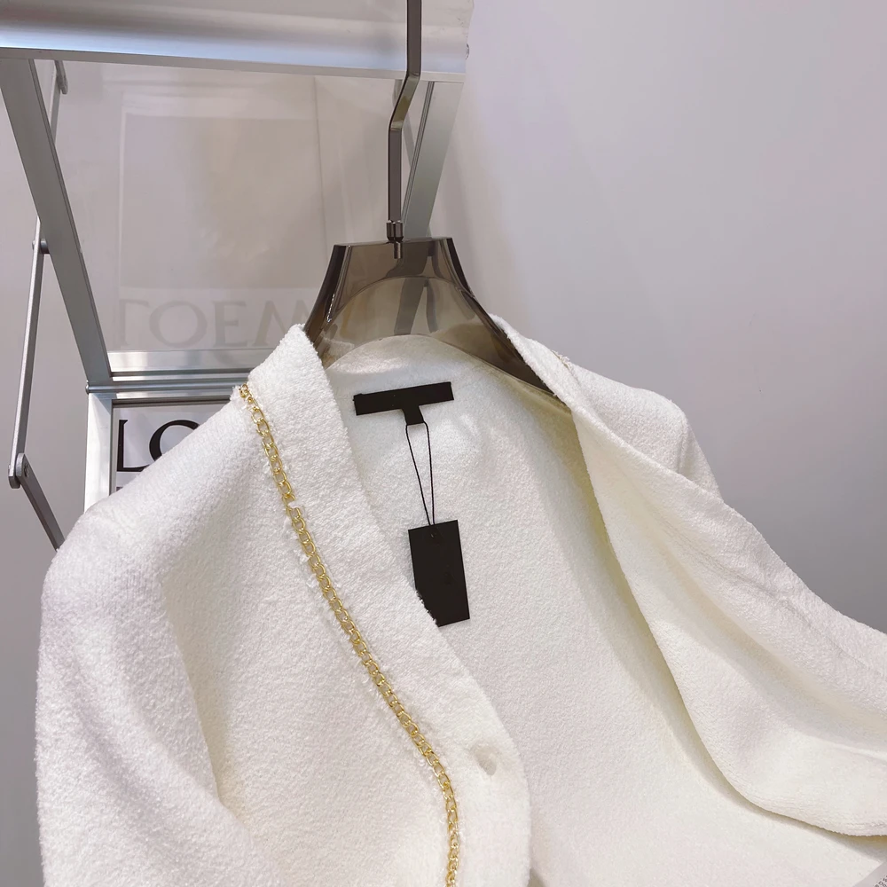 

2021 spring European and American style solid color V-neck loose coat women's knit sweater metal chain cotton woolen cardigan