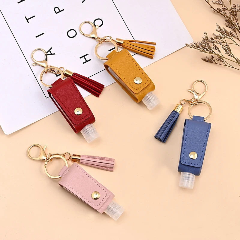 

4Pcs 30ml Portable Empty Leakproof Plastic Travel Bottle for Hand Sanitizer with Tassels Leather Keychain Holder Carriers