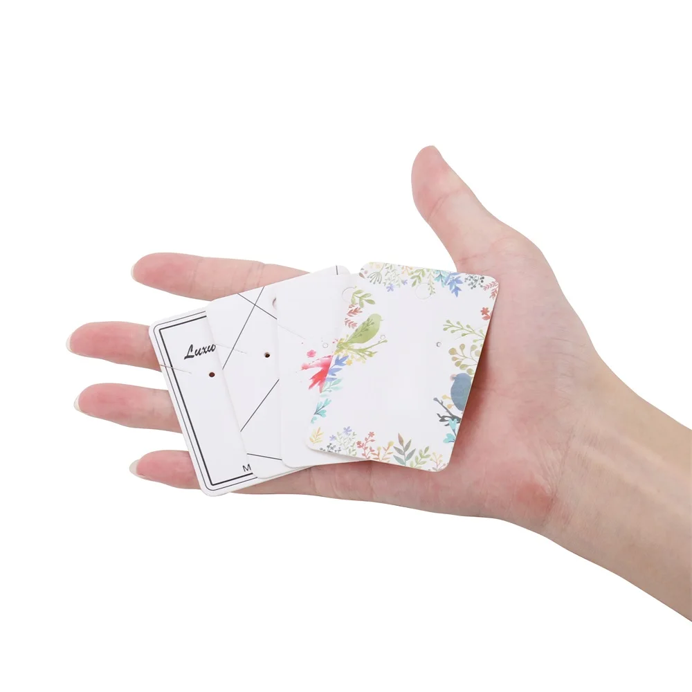 Серьги-гвоздики с перьями 5-7 см 20-50 шт