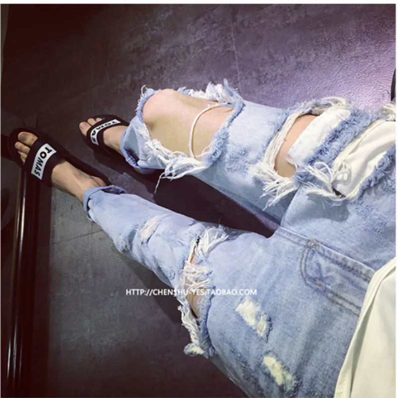 Men's jeans European and American ripped jeans Fashionable men's cropped trousers large casual pants nightclub stage fashion