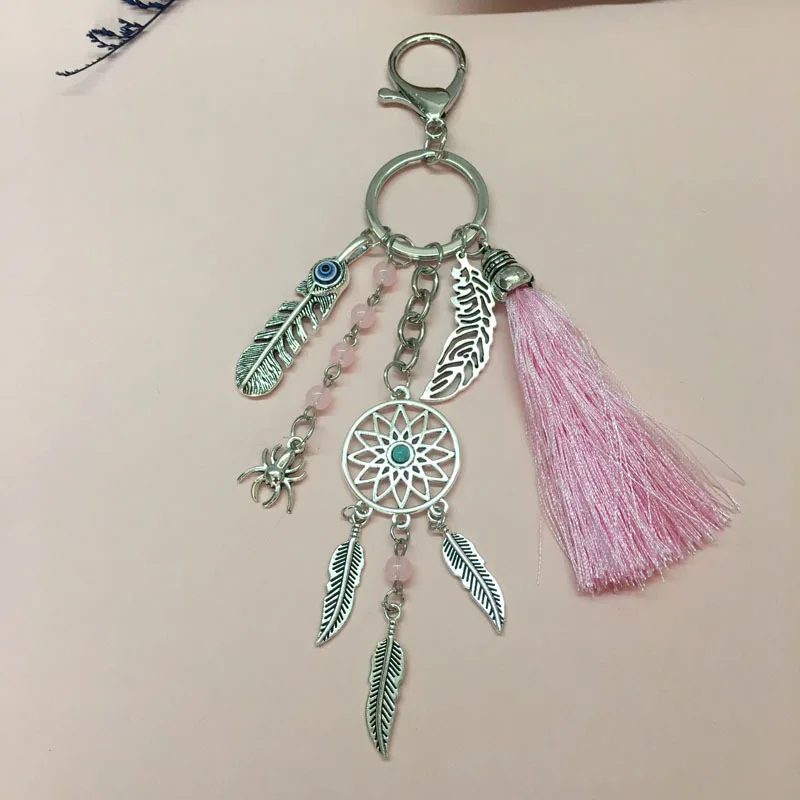

Explosive bohemian woolen thread tassel keychain men and women turquoise leaf bag pendant car key pendant wholesale
