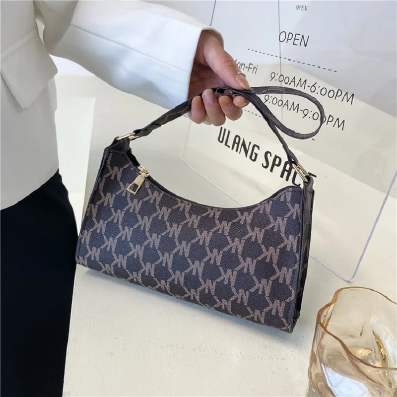 

Underarm PU leather shoulder new moon bag shoulder bag PU zipper handbag Korean retro shoulder bag French stick bag tide.