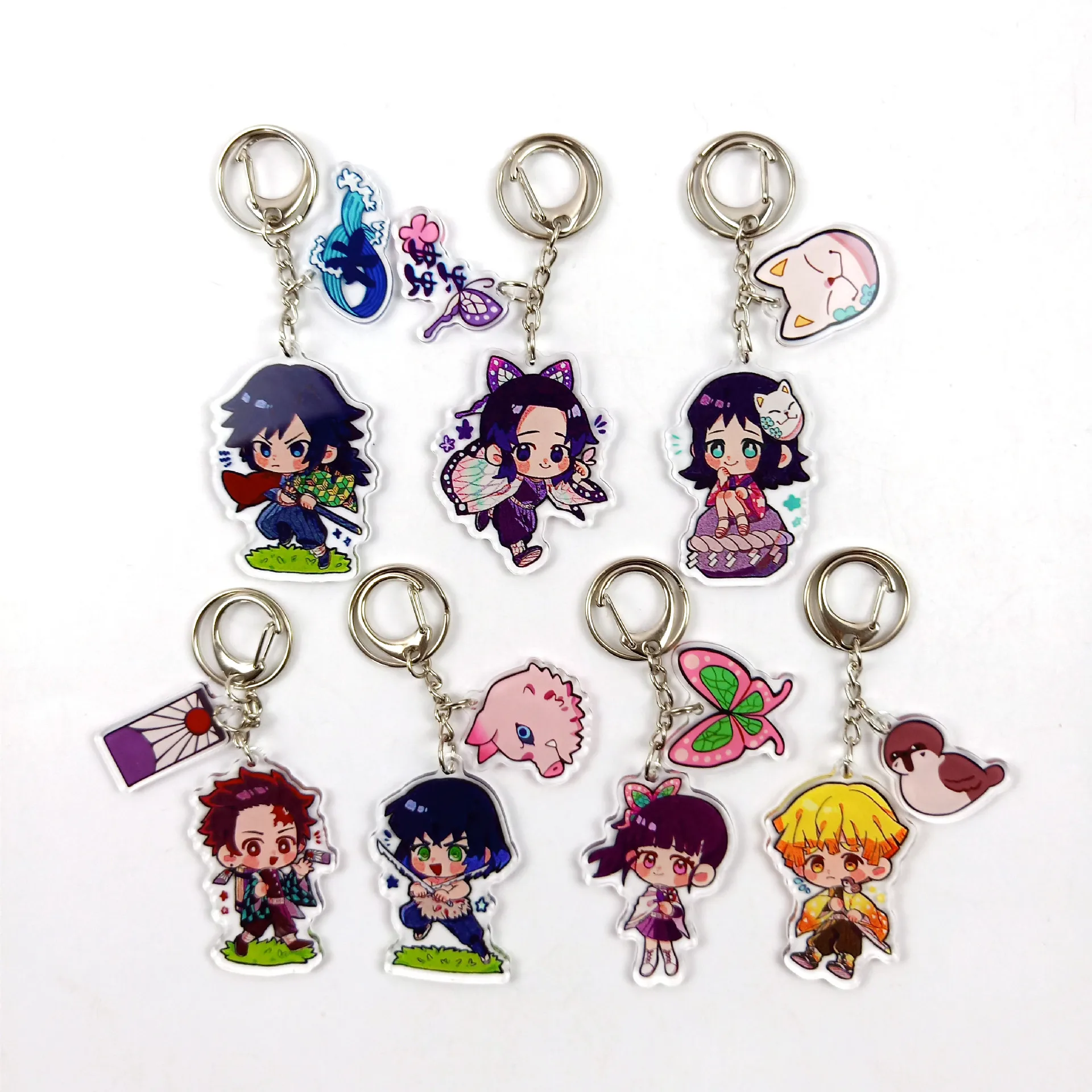 

Anime Demon Slayer Acrylic Keychain Cute Brinco Blade Of Ghost Key Chain Kamado Tanjirou Cosplay Pompom Yaiba Keyring Pendant