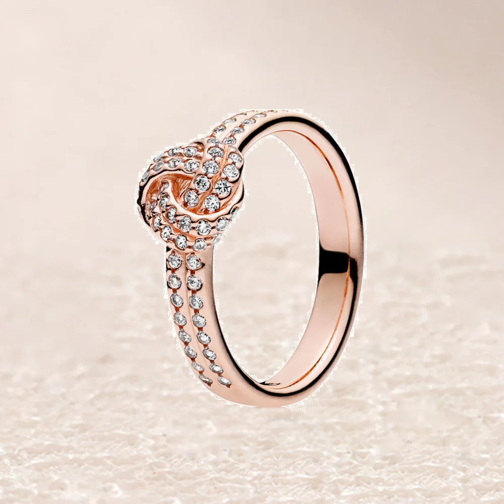 

180997CZ ROSE SPARKLING LOVE KNOT RING