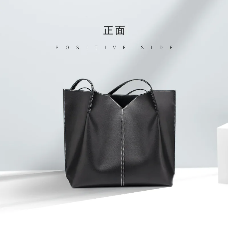 

Female bag 2020 autumn and winter new fashion trend simple large capacity cowhide bag niche design shoulder bag