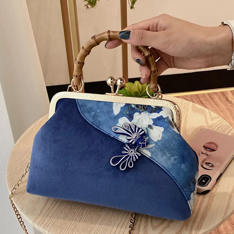 

Elegant hand-held cheongsam bag female celebrity bamboo hand-held finished bag Chinese style golden velvet splicing Dinner Bag