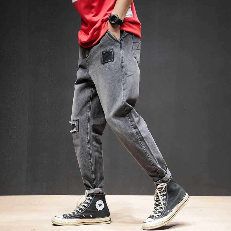 Мужские рваные джинсы с дырками скинни от известного дизайнера байкерские