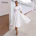 Платье-туника на пуговицах с круглым вырезом, коротким рукавом и открытой спиной