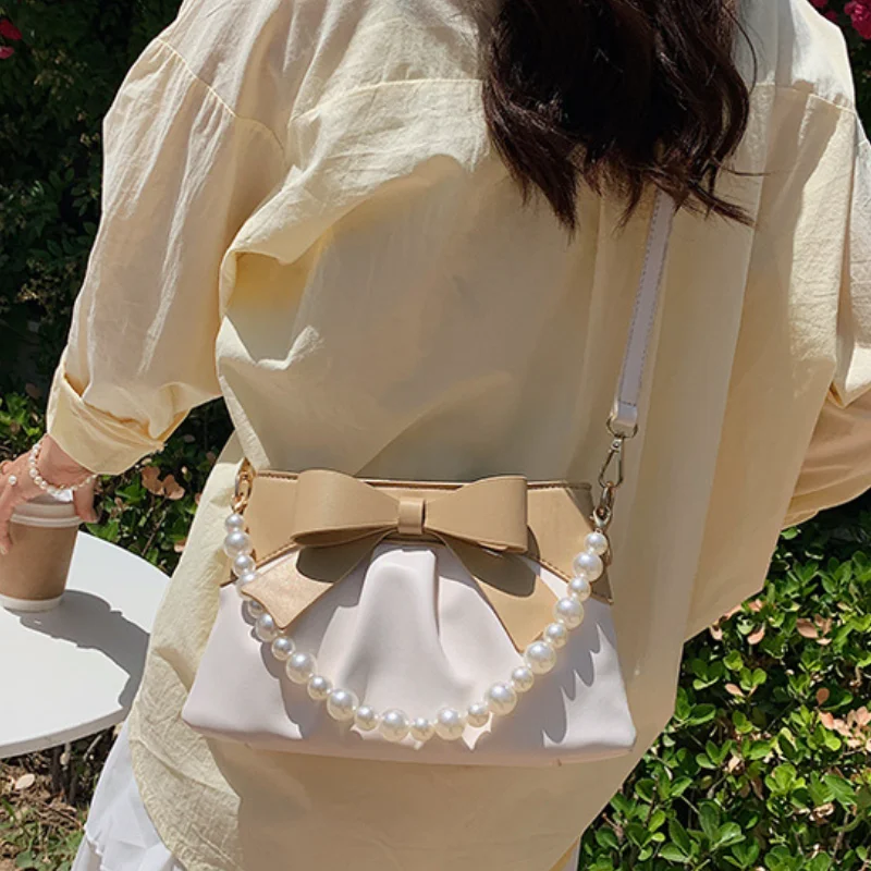

Pu Leather Women Bow Handbag 2021 New Fashion Pearl Chain Small Bucket Bag For Ladies Fold Shoulder Cross-body Bag