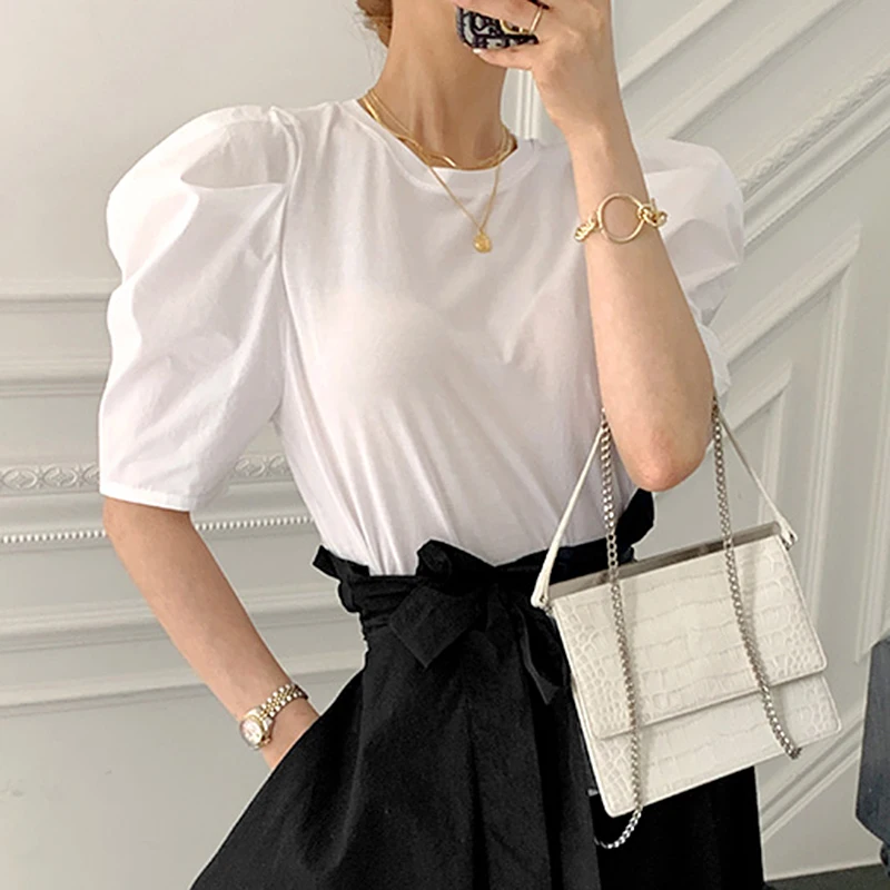 

2021 summer temperament female round neck puff sleeve loose casual all-match solid color stitching T-shirt KK364