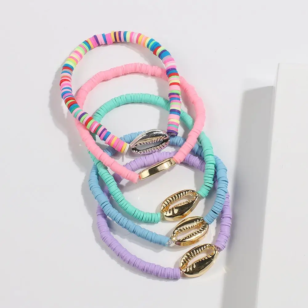 Женский браслет в виде ракушек розовый и белый ручной работы богемном стиле |