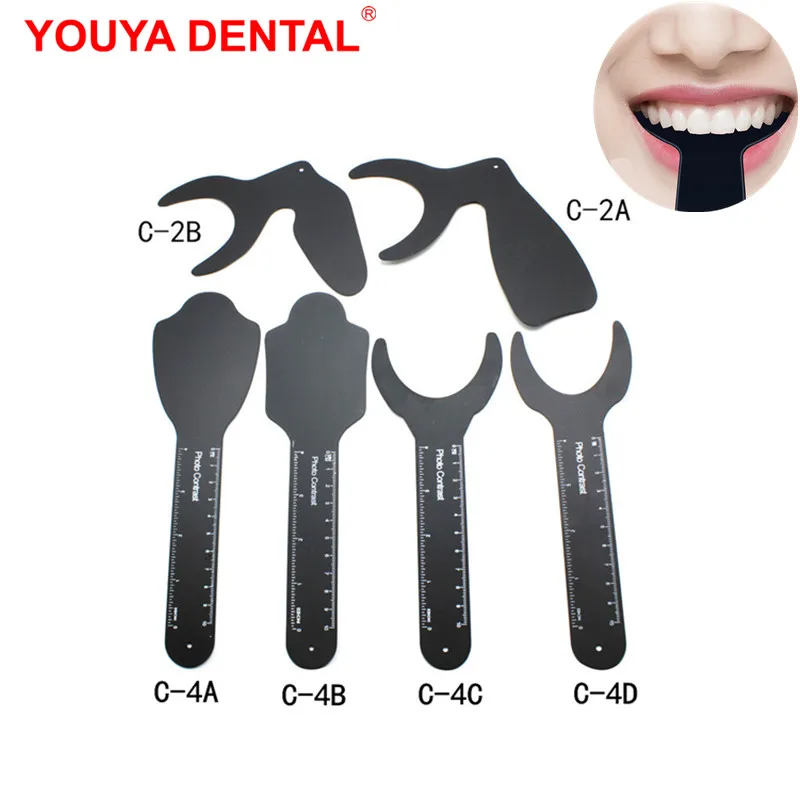 Ортодонтическая доска с черным фоном изображение контрастная стоматологическая