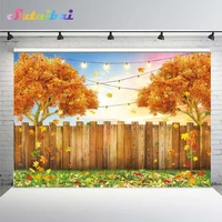autumn blessing fallen maple leaves lights thanksgiving family party backdrop trees wood fence grass fall background photocall