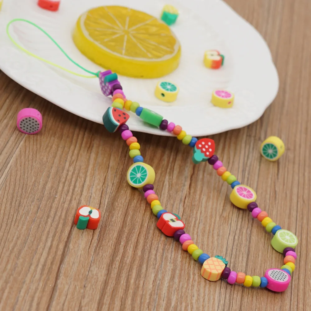 2021 New Colorful Rice Beads Mobile Phone Chain Female Cute Soft Pottery Fruit Beaded Hanging Jewelry Accessories |