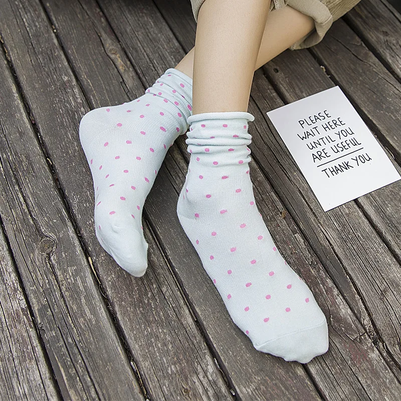 

Autumn and winter women socks roll edge pile pile socks little female socks loose mouth tube socks