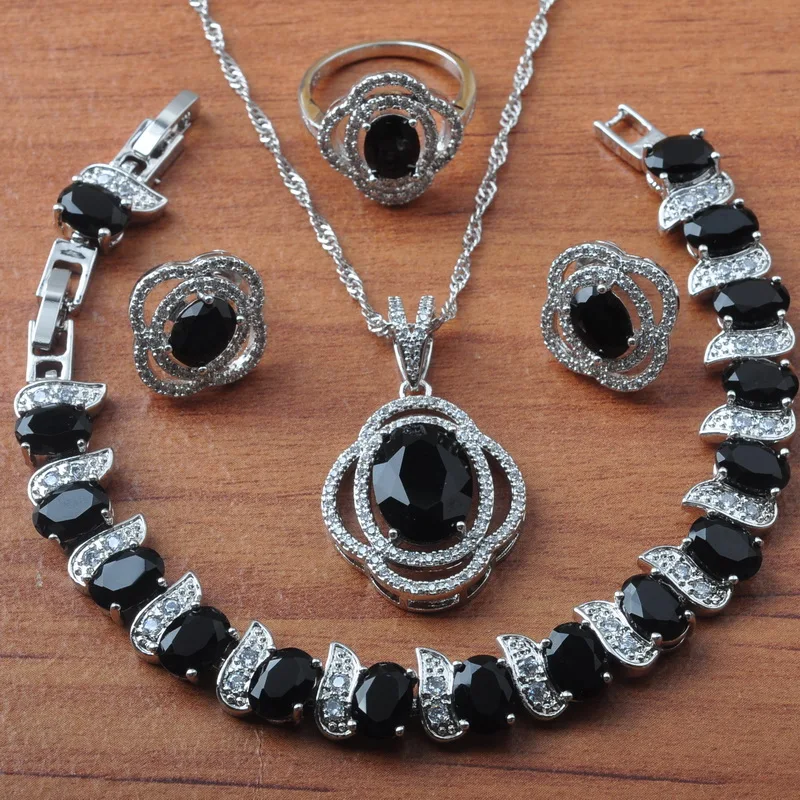 Необычные наборы ювелирных изделий из черного циркона серебряного цвета