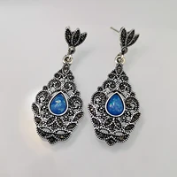 new hollowed out carved flowers inlaid black diamond synthetic sea blue opal earrings vintage ear pin hanging earrings jewelry