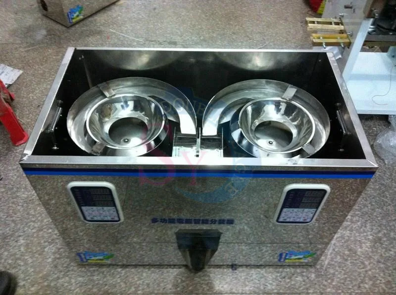 安い 100グラムダブルヘッドスパイラル粒子充填計量機/ビッグ穀物医学カシューナットカカオ豆混合包装機